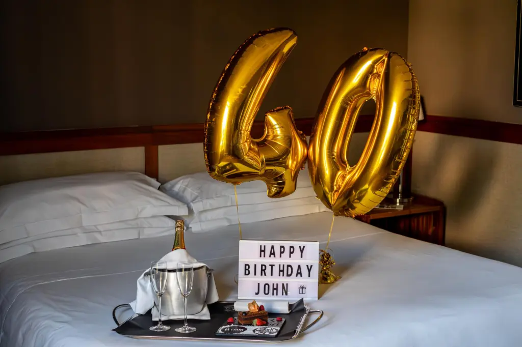 A festive birthday setup with vibrant colors and decorative elements that create a joyful, celebratory atmosphere, ideal for hotel celebrations.