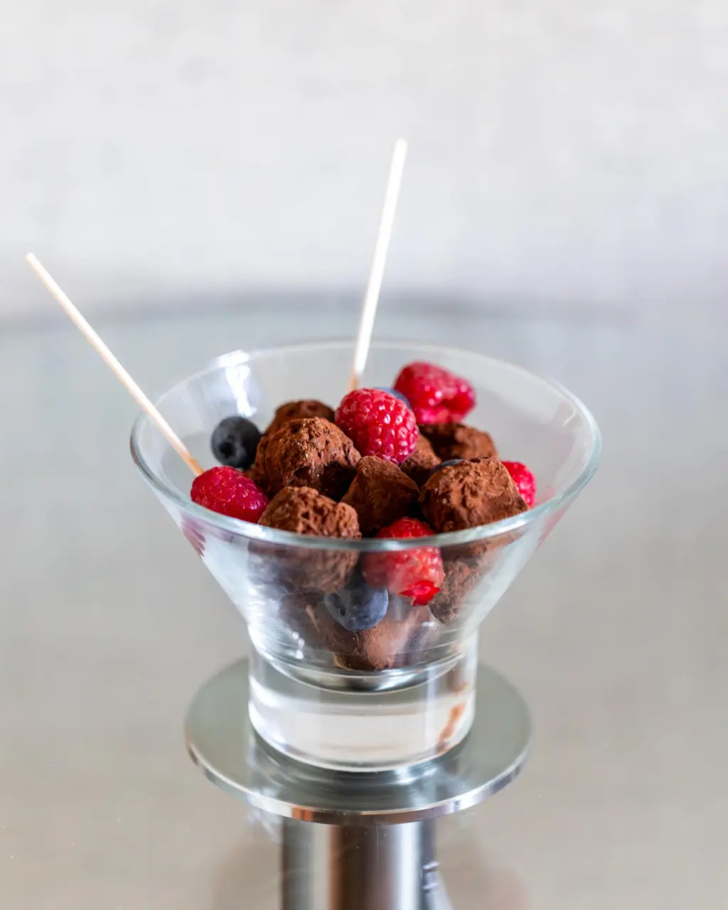 Image of delicious chocolate truffles with a glossy, smooth coating, perfect for an elegant dessert or a special gift.